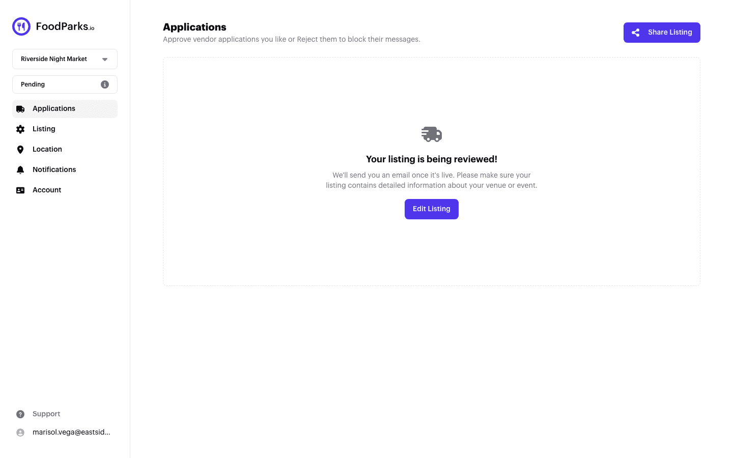 The Applications page for a newly submitted listing, showing 'Your listing is being reviewed!' with a note that an email will follow once it's live.