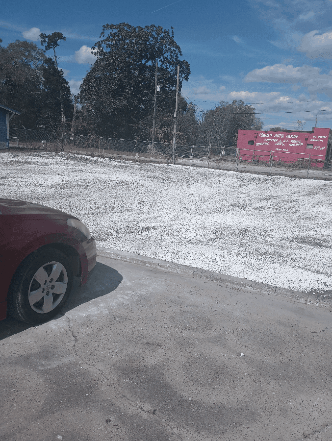 Space in paved lot on Main St